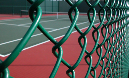 This is a photo of a new tennis court fence installed in Wiltshire, All works carried out by Tennis Court Construction Wiltshire