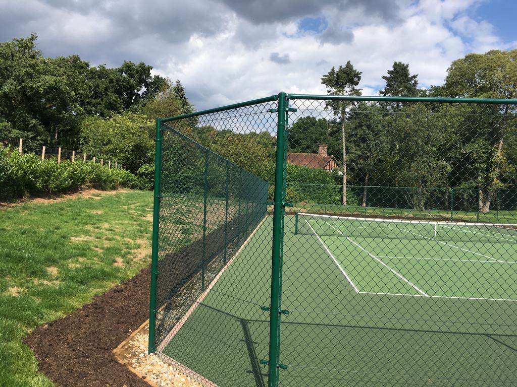 This is a photo of a new tennis court fence installed in Wiltshire, All works carried out by Tennis Court Construction Wiltshire