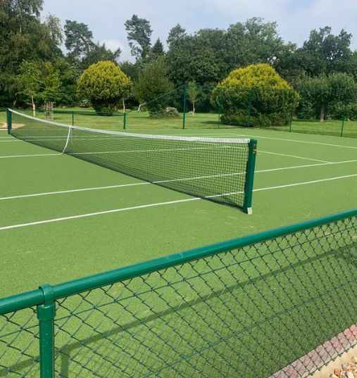 This is a photo of a new tennis court installed in Wiltshire, All works carried out by Tennis Court Construction Wiltshire