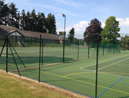 This is a photo of a new tennis court installed in Wiltshire, All works carried out by Tennis Court Construction Wiltshire