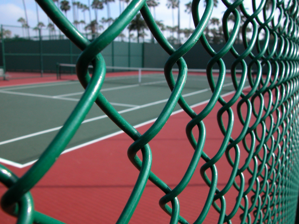 This is a photo of a new tennis court fence installed in Wiltshire, All works carried out by Tennis Court Construction Wiltshire