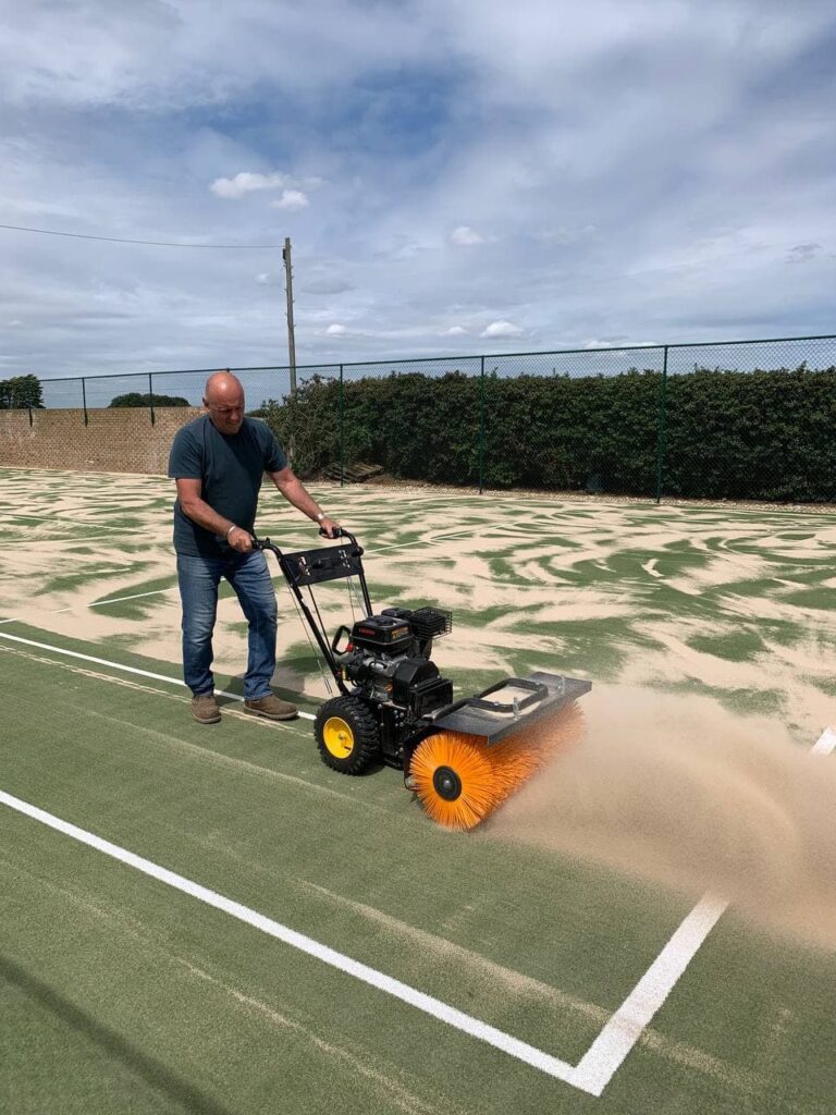 This is a photo of a tennis court in Wiltshire that is in need of refurbishment